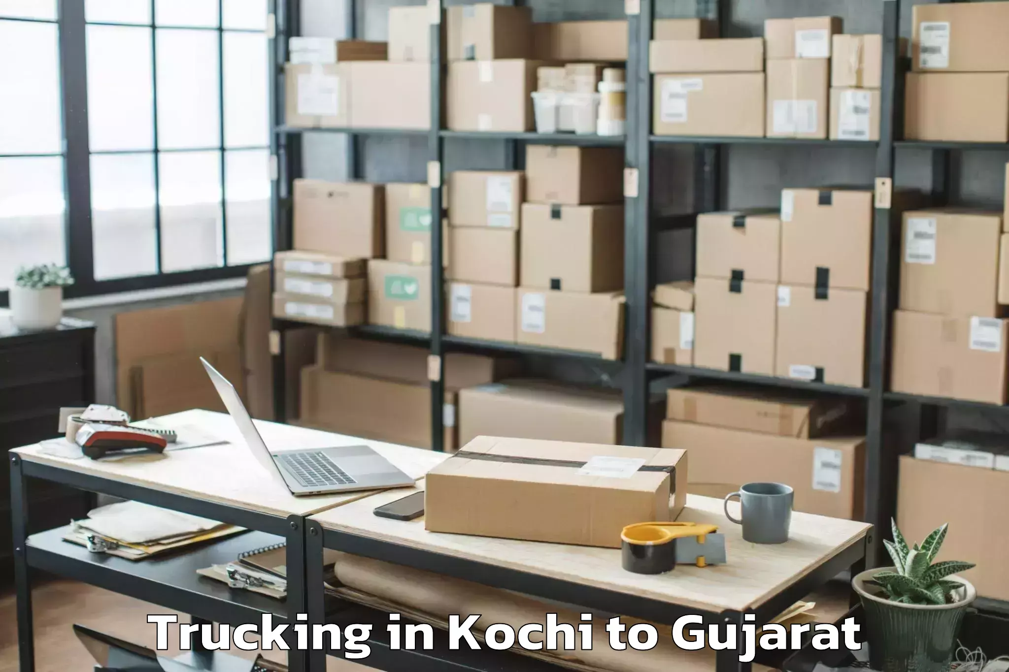 Affordable Kochi to Gls University Ahmedabad Trucking